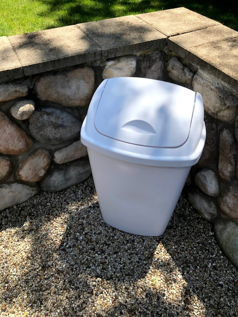 Garbage can in courtyard is not pretty but is essential!