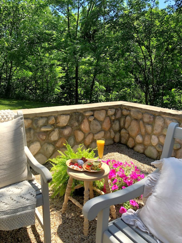Simple sweet and savory appetizers served in our French inspired courtyard with pea gravel and stone walls. #hellolovelystudio #frenchcourtyard #outdoorentertaining #summerentertaining #appetizerideas #summerentertaining