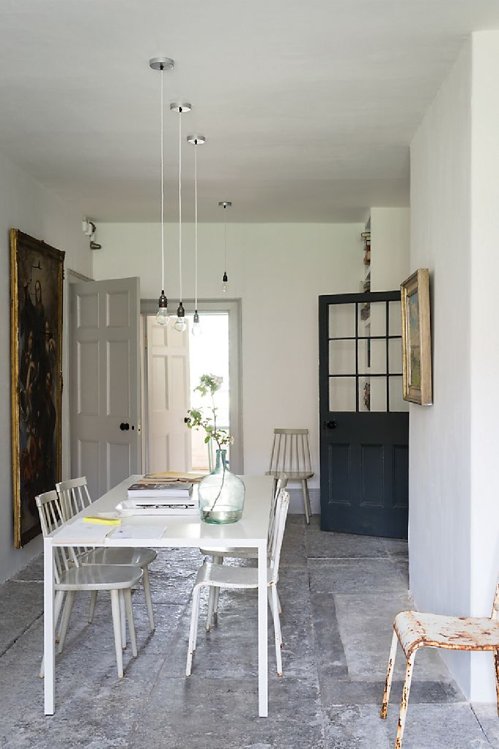 Ammonite paint color by Farrow & Ball is a wonderful warm greyed white with an atmospheric, serene mood. #ammonite #farrowandball #paintcolors #lightgrey #diningroom #europeancountry #rusticdecor