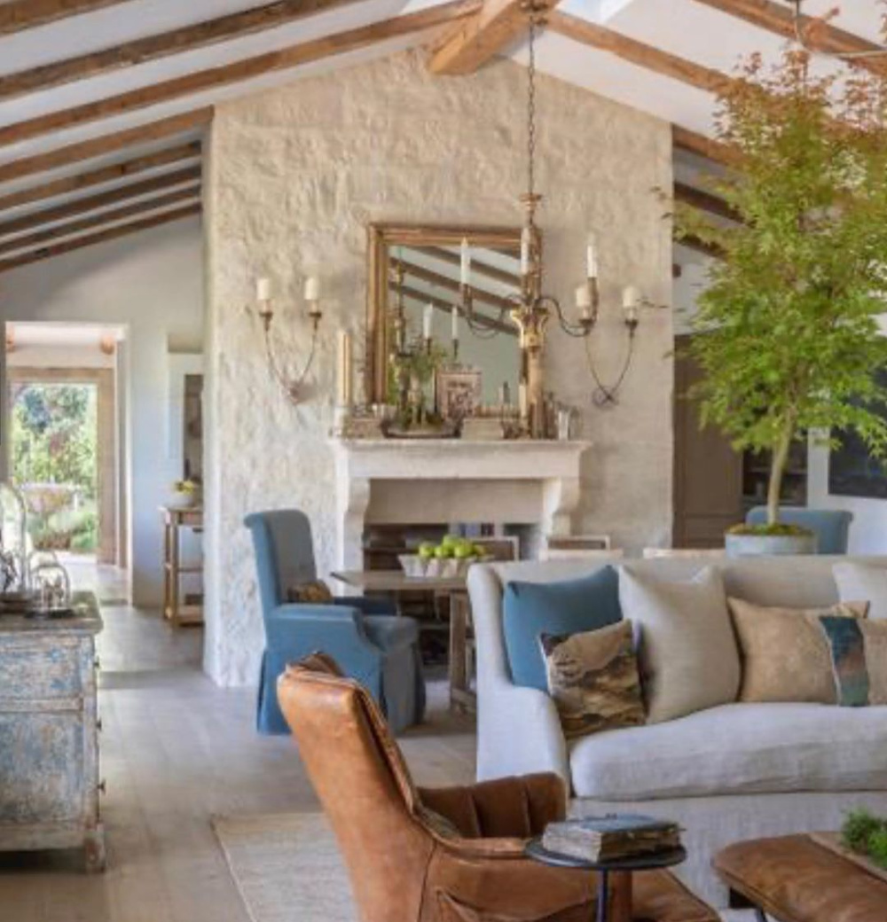 Patina Farm living room with Belgian linen furniture, limestone fireplace, and white oak hardwood floors. #patinafarm #giannettihome #modernfarmhouse #livingroom