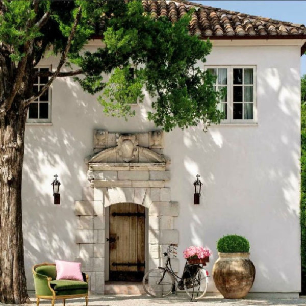 Gorgeous white stucco French farmhouse inspired house exterior with tile roof - Reagan Andre. #pamelapierce #reaganandre #frenchfarmhouse #houseexterior #housedesign #whitestucco