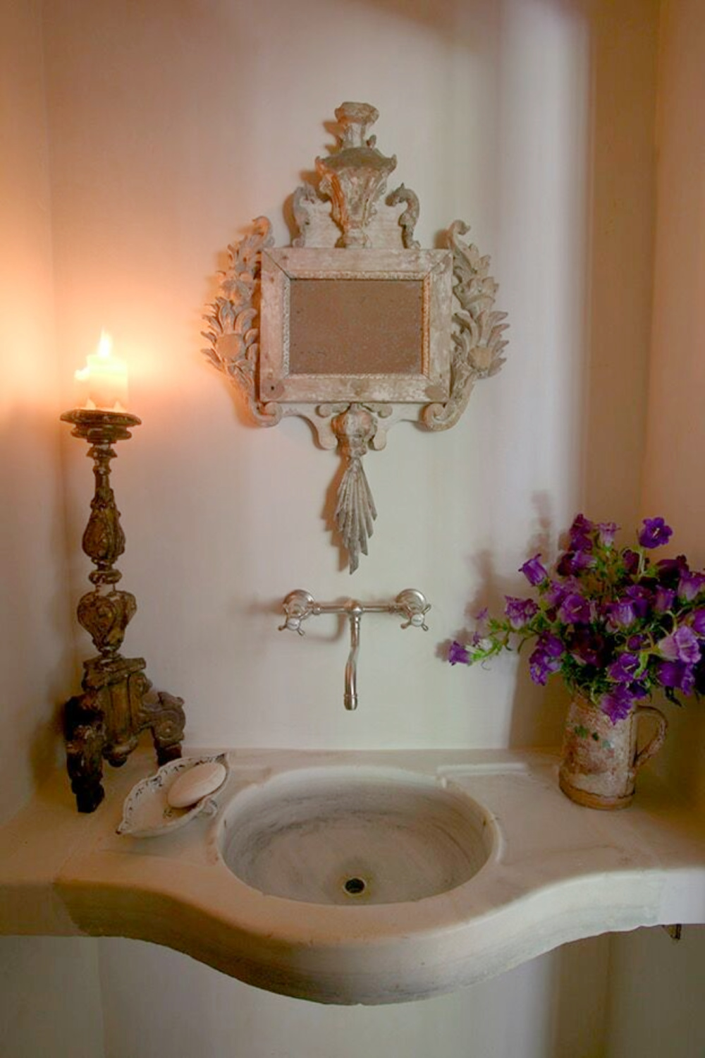 Authentic country French bath with antique stone sink and wall mount faucet - in Ruth Gay's (Chateau Domingue) home. Come tour more of the exquisite interiors!