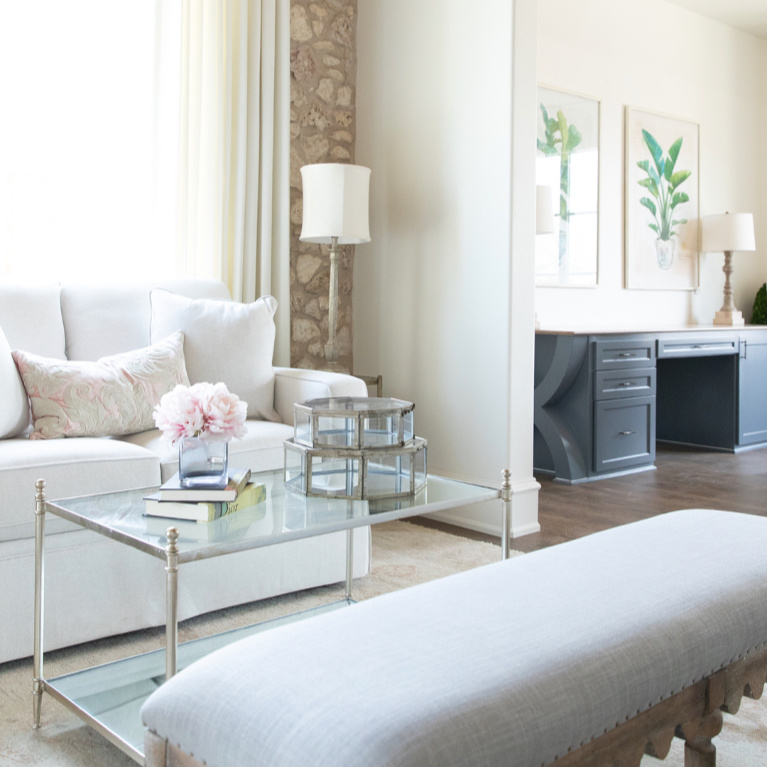 Pretty and elegant sitting room in French country bedroom by Brit Jones. #interiordesign #frenchcountry #bedroomdecor #sittingroom #modernfrench