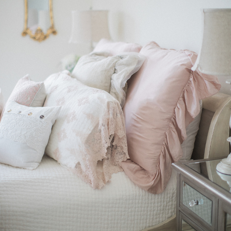 Feminine and romantic French country girls bedroom with pale pink and white linens and Alabaster painted walls - Brit Jones. #girlsbedroom #pinkbedrooms #bedroomdecor #interiordesign #romanticdecor #frenchcountry