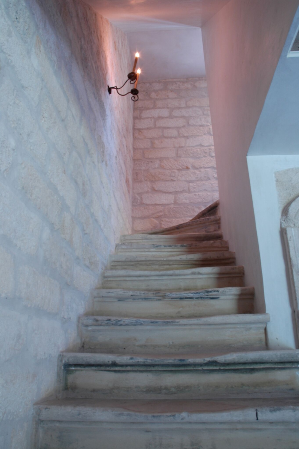 Detail of the rustic elegant staircase in Ruth Gay's home - Chateau Domingue.