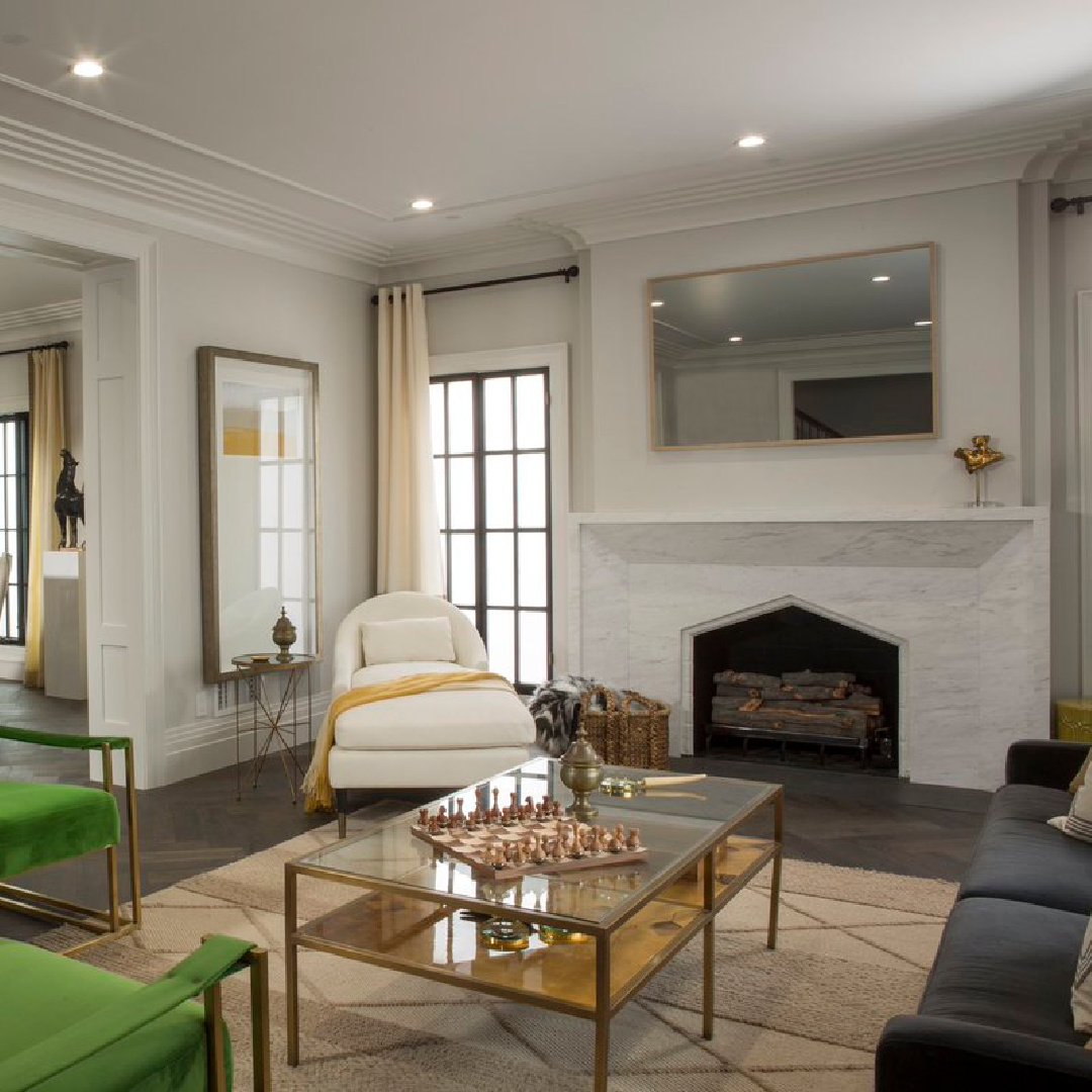 Living room with fireplace in HGTV Property Brothers Drew Scott's honeymoon house with Linda in LA's Windsor neighborhood. #drewhoneymoonhouse #drewandlindahouse