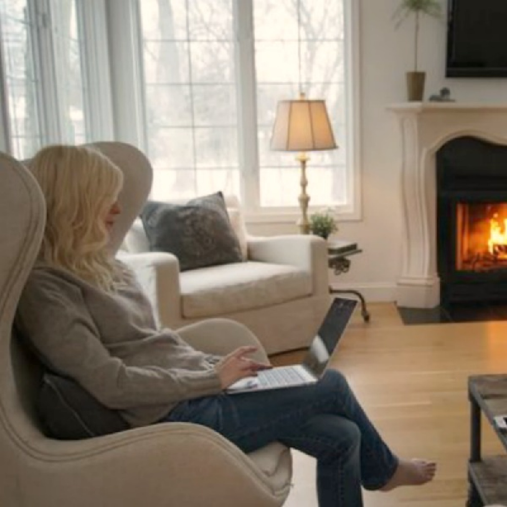 Belgian linen upholstered furniture including swivel egg chair in my living room with white oak hardwoods - Hello Lovely.