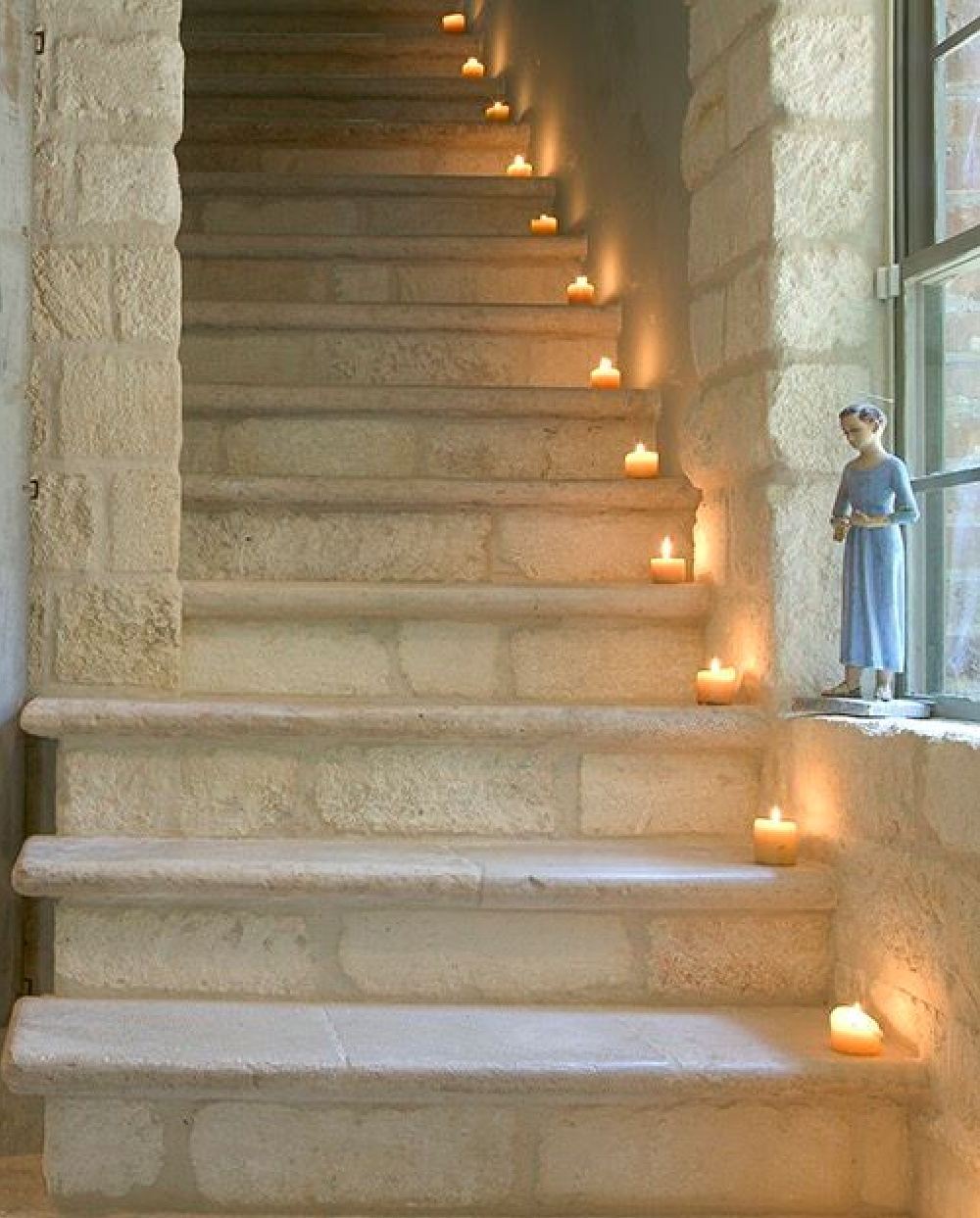 Breathtaking French limestone staircase in Ruth Gay's country French home - Chateau Domingue.