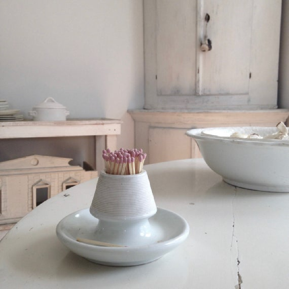 Antique bistro pyrogene French match strike in all white kitchen with Swedish corner cabinet - My Petite Maison.
