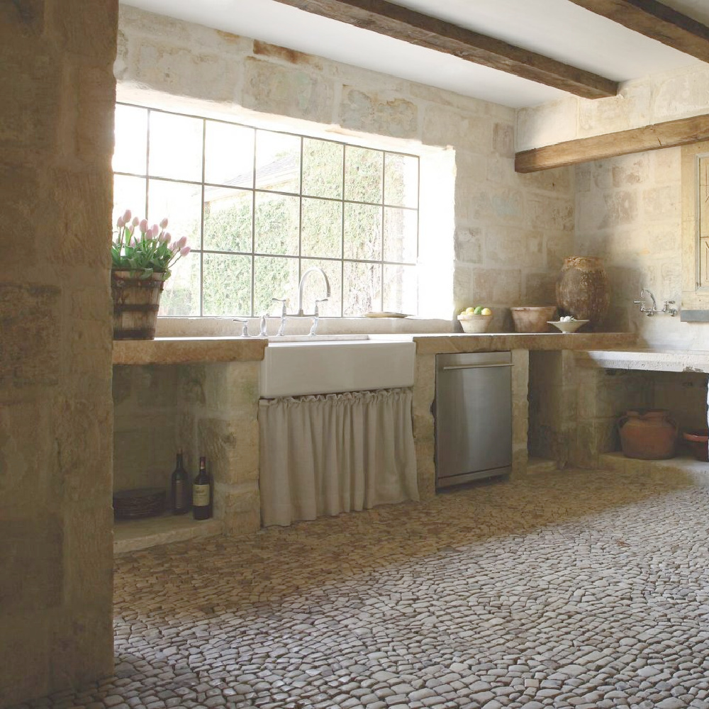 French farmhouse kitchen of Ruth Gay of Chateau Domingue. See more Gorgeous European Country Interior Design Inspiration on Hello Lovely. #europeancountry #frenchfarmhouse #interiordesign