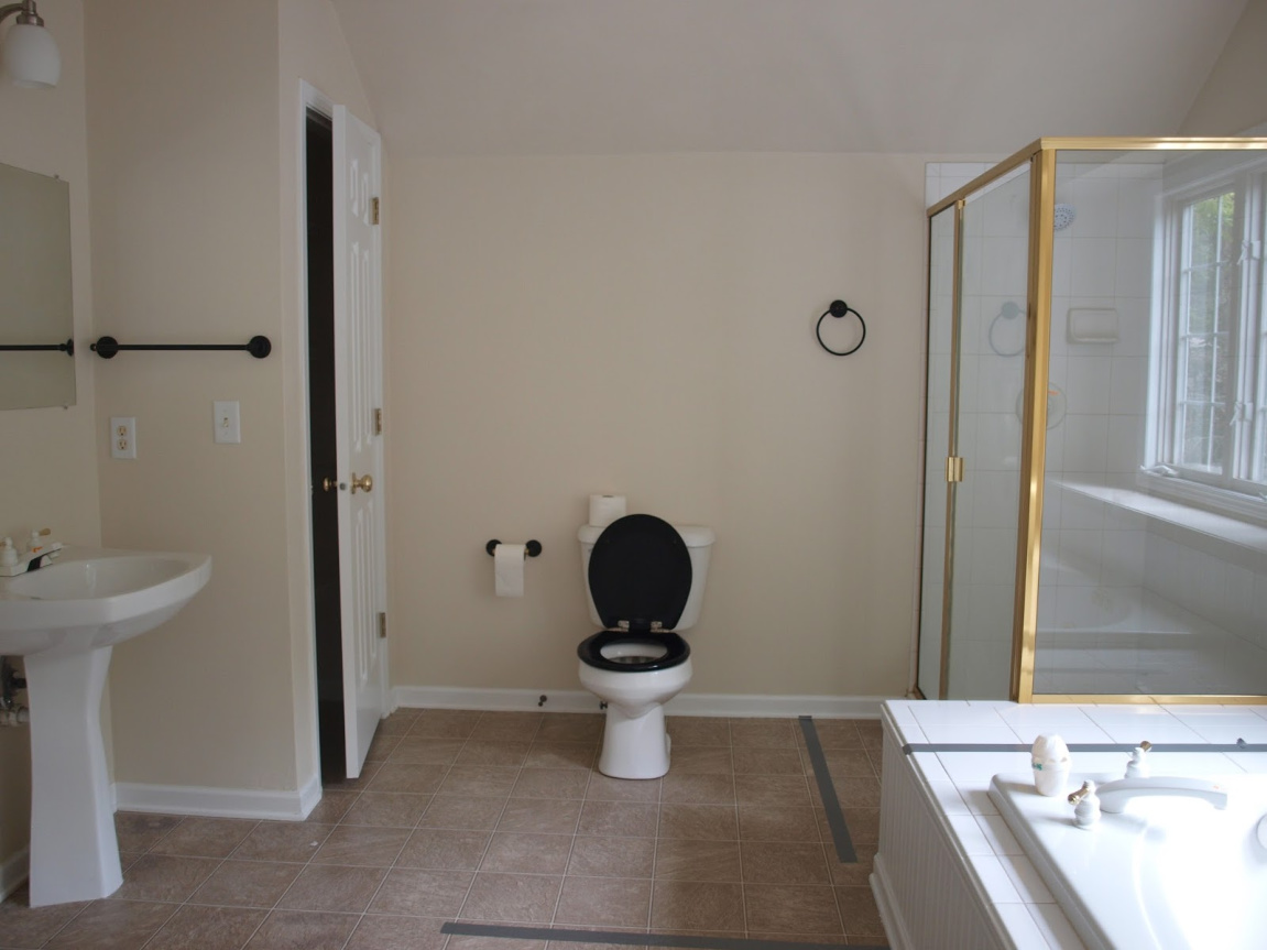 before pic of Hello Lovely Studio's master bathroom renovation