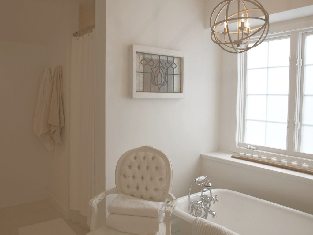 View of shower and tub area of our renovated French country master bathroom. #hellolovelystudio #frenchcountry #bathroom