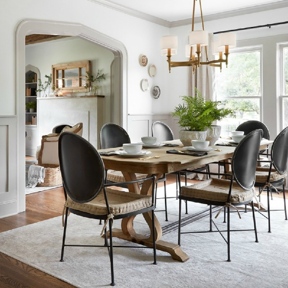 Light grey trim, white walls, and neutral elegant classic dining room. Come get the Look of the Scrivano Tudor renovated by Joanna & Chip on HGTV's FIXER UPPER! #scrivano #fixerupper #diningroom