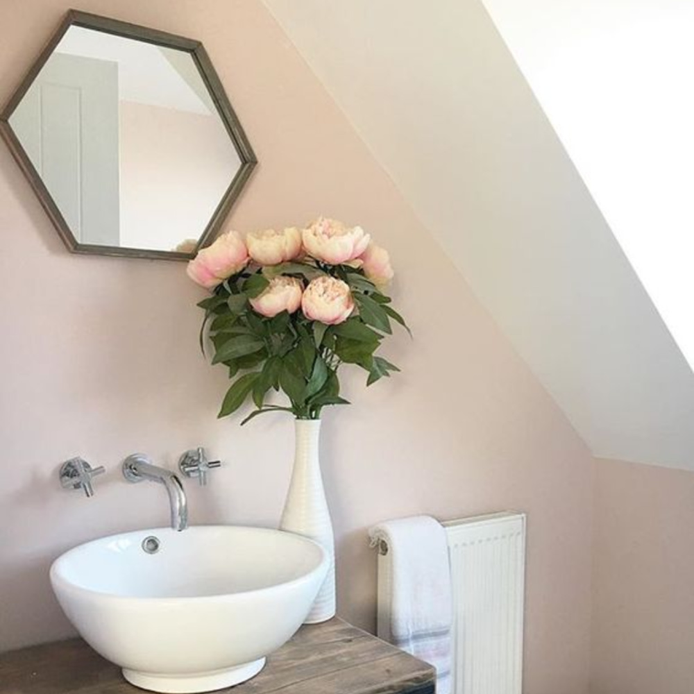 Calamine (Farrow & Ball( pink in a bath with vessel sink and wall mounted faucet. Come see the Best Sophisticated, Chic and Subtle Pink Paint Colors on Hello Lovely Studio!