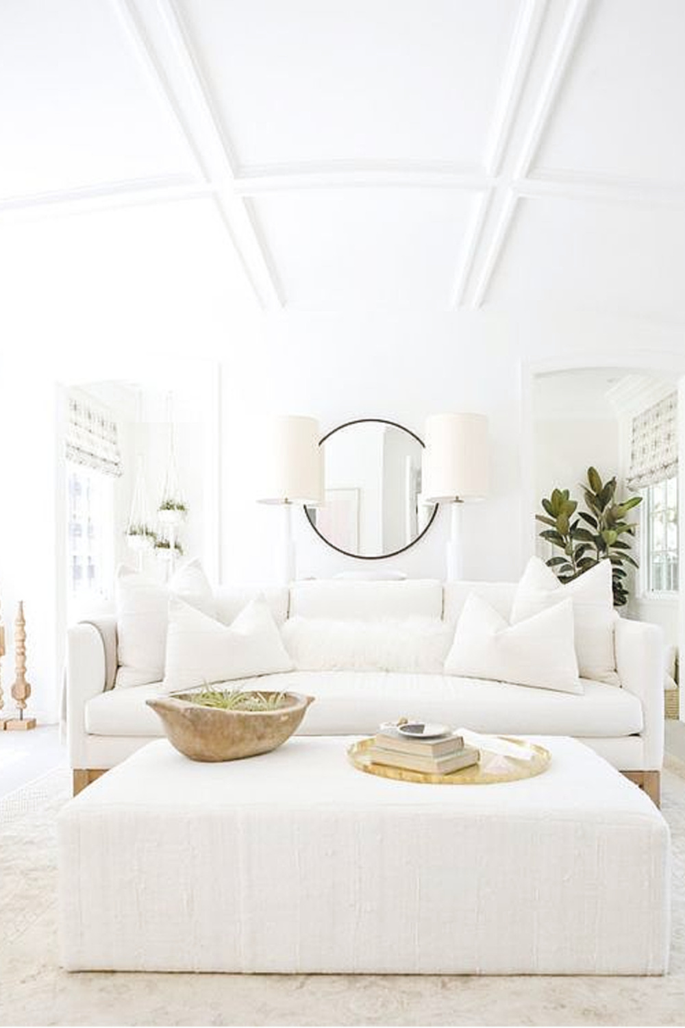 Erin Fetherston's white living room in LA. Come explore California modern farmhouse interior design inspiration! #modernfarmhouse #livingrooms #whitedecor #interiordesign