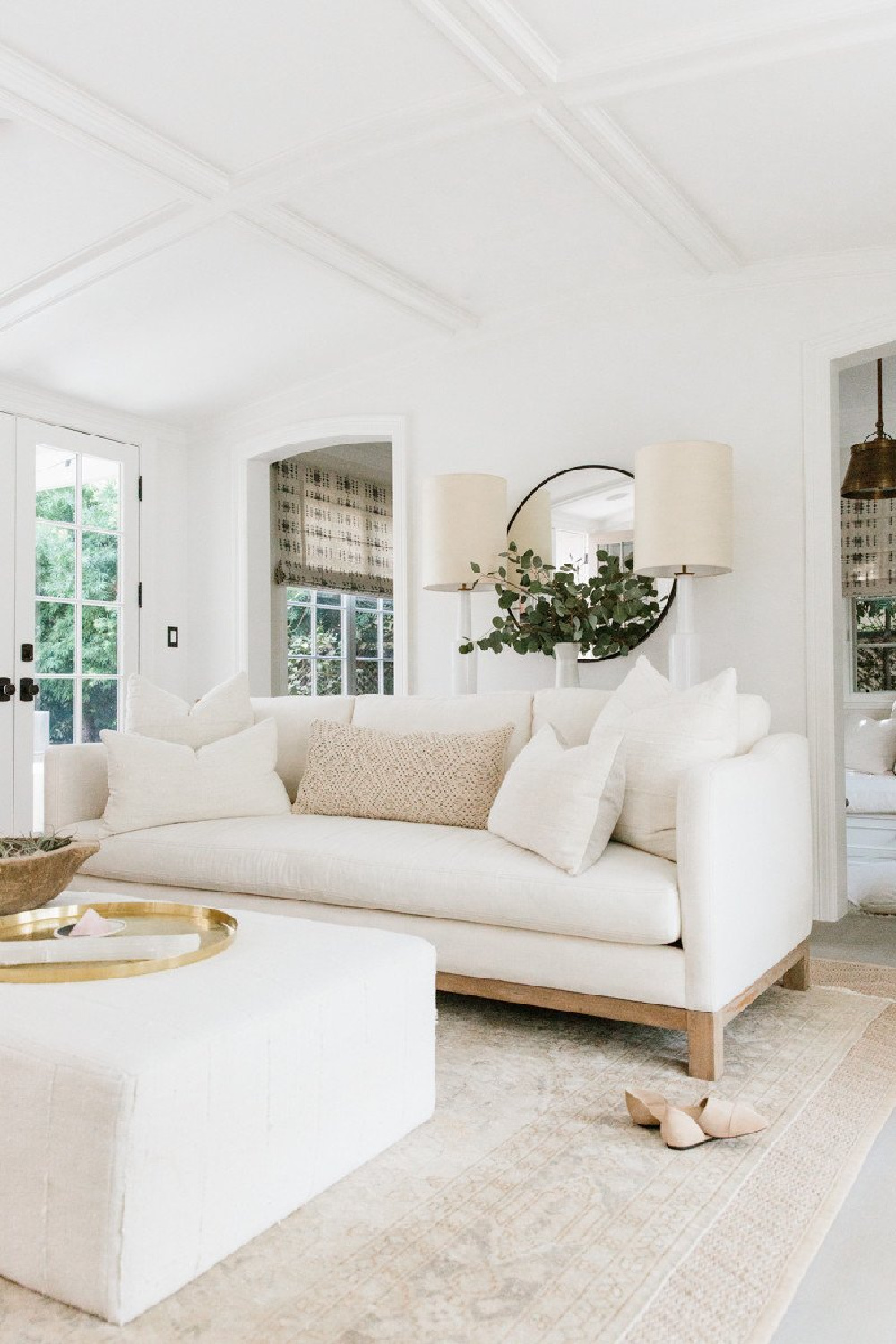 Erin Fetherston's white living room in LA. Come explore more California modern farmhouse interior design inspiration! #modernfarmhouse #livingrooms #whitedecor #interiordesign