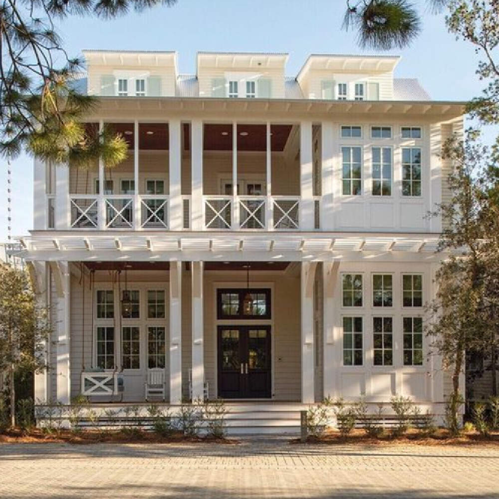 Magnificent coastal home exterior (architecture: Geoff Chick) with bracketed entry trellis and magnificent porch. #coastalhomes #beachhouses