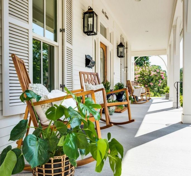 Charming front porch on a Southern home by Garden Gate Homes. Come peek at Charming Porch Inspiration & Decor Ideas. #frontporches #southernhomes #houseexteriors #porchdecor #porches