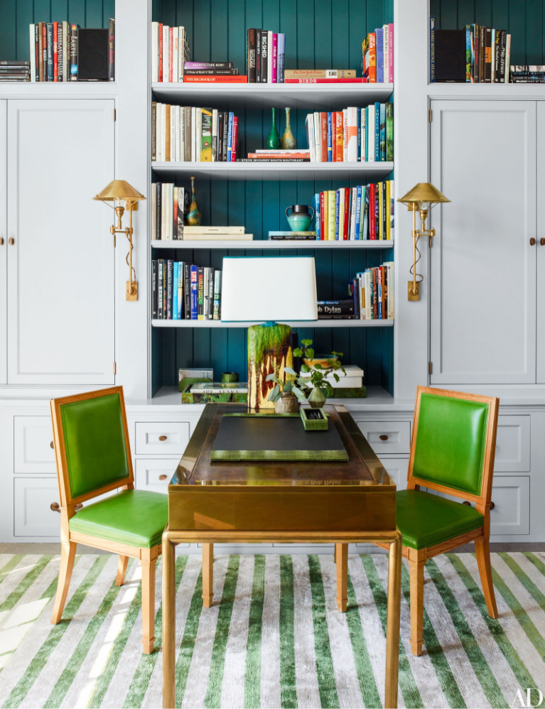 Breathtaking home office with built-ins and vivid green - Steven Gambrell. #homeoffice #interiordesign #brightgreen #builtins