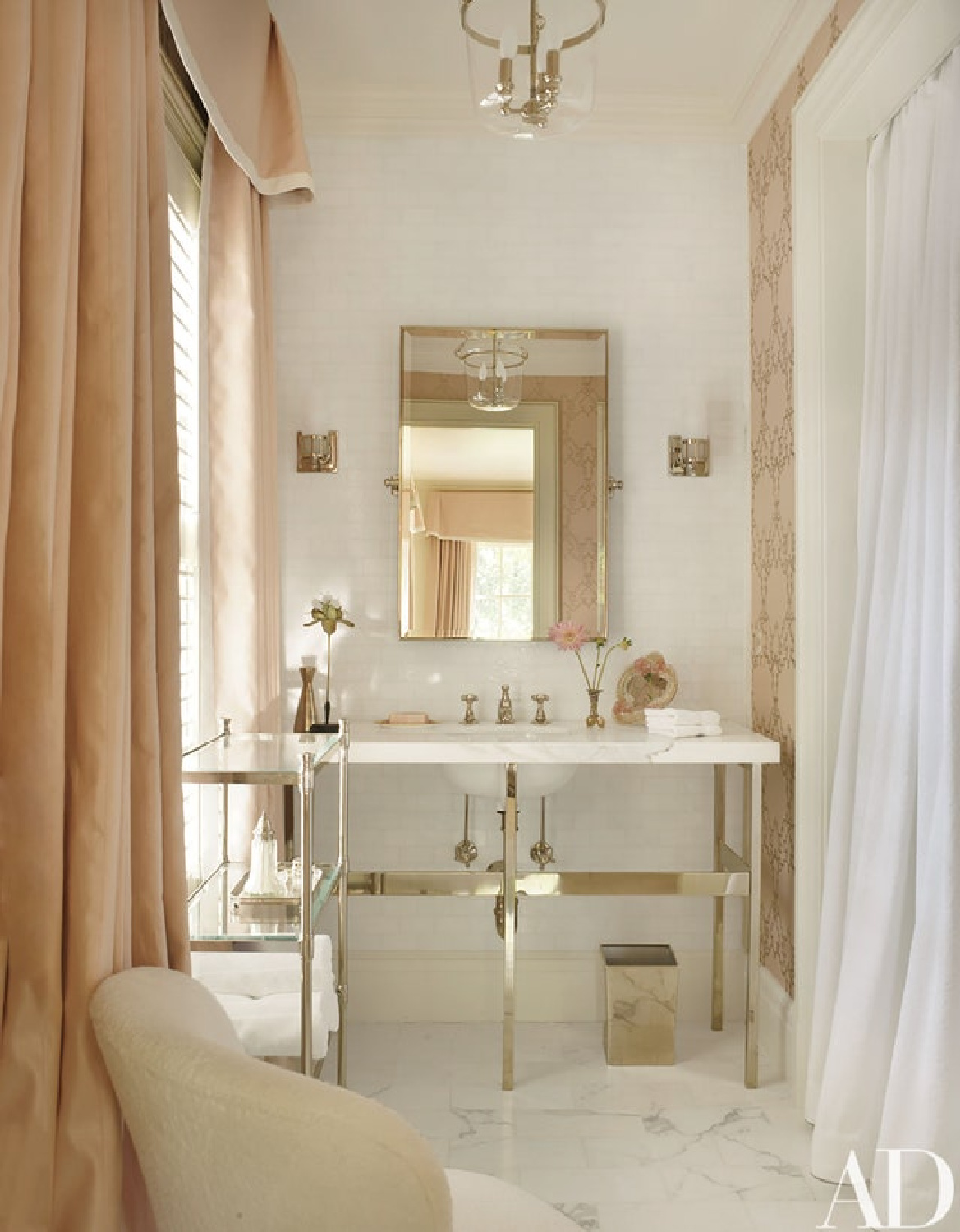 Intimate White (Sherwin Williams) pale pink paint color in Suzanne Kasler designed luxurious bath with pink curtains. #intimatewhite