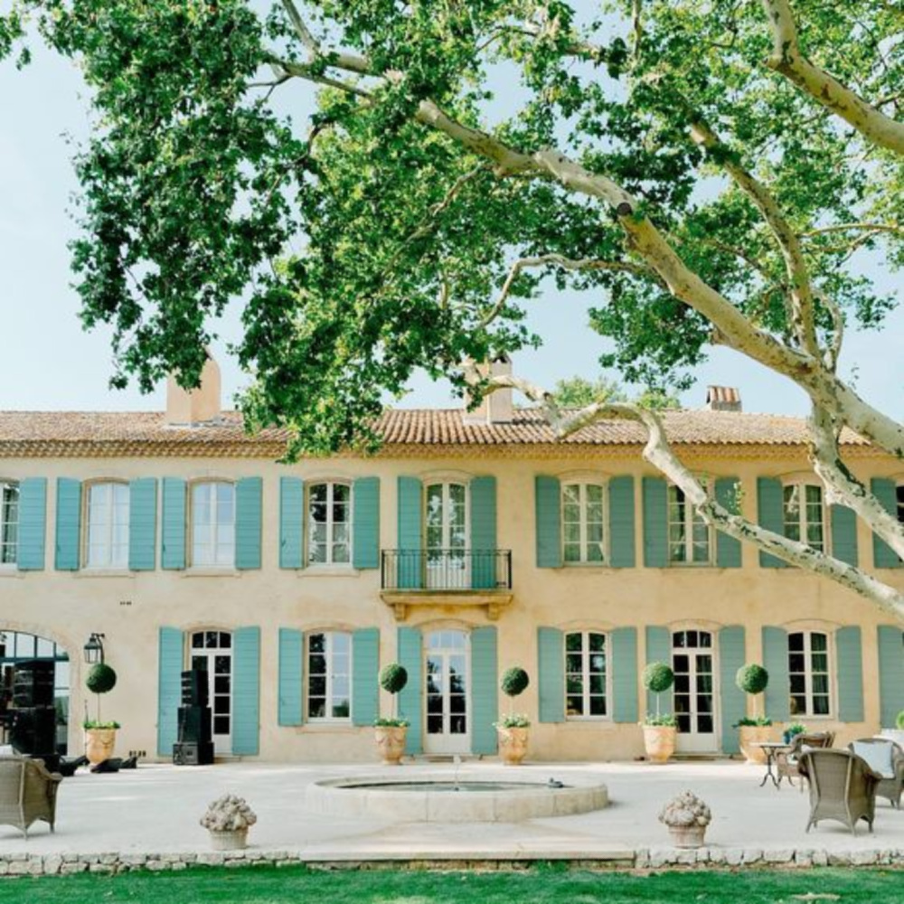 Provence French farmhouse exterior with blue-green shutters - Le Mas des Poiriers.