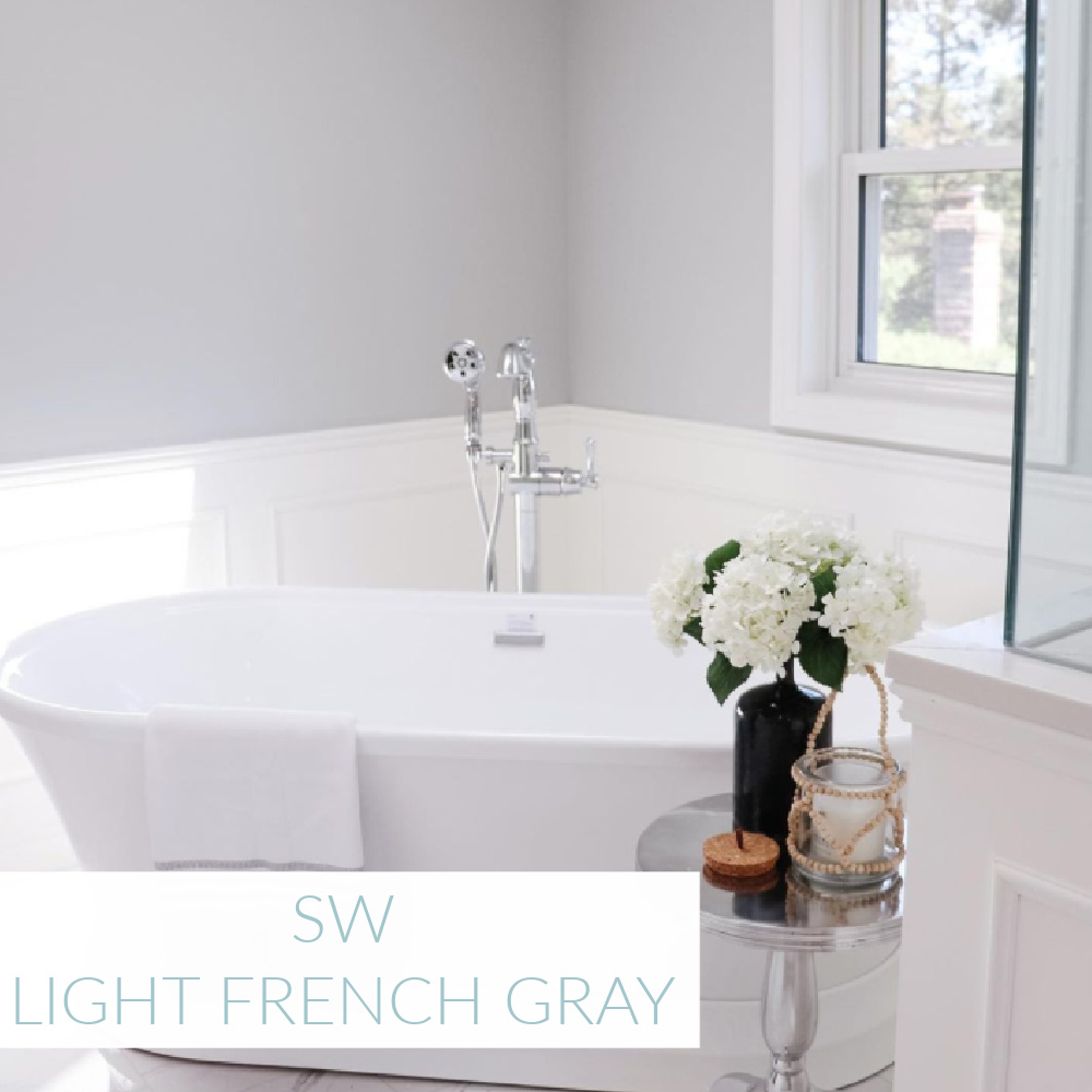 Light French Gray SW paint color in a luxurious bath by @thisprettylifexo. #lightfrenchgray #greypaintcolors #sherwinwilliamslightfrenchgray