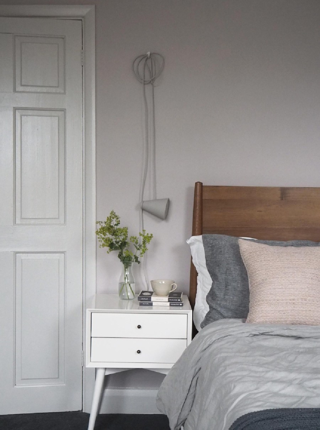 A soft blush pink bedroom with Farrow & Ball's Peignoir