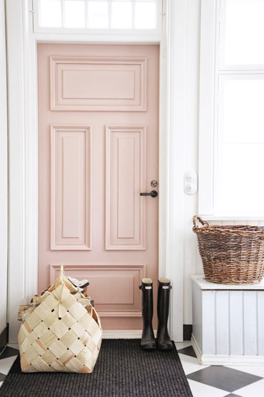 Front door of London home with checkered floors painted Pink Ground from Farrow & Ball. #pinkpaintcolors #pinkground