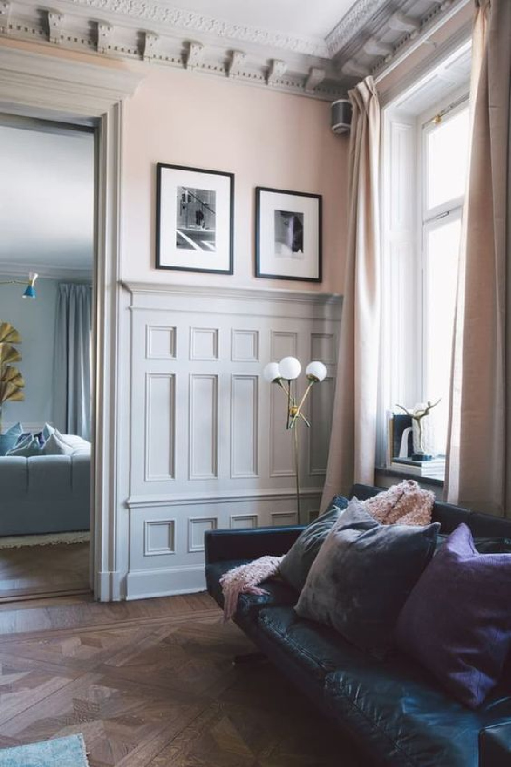 Farrow and Ball Pink Ground in a European home with parquet wood floor and traditional paneled walls.