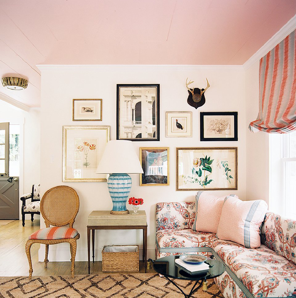 Rosy pink ceiling in chic boho ecelctic den with gallery wall - via HonestlyWTF #pinkpaint #pinkceiling