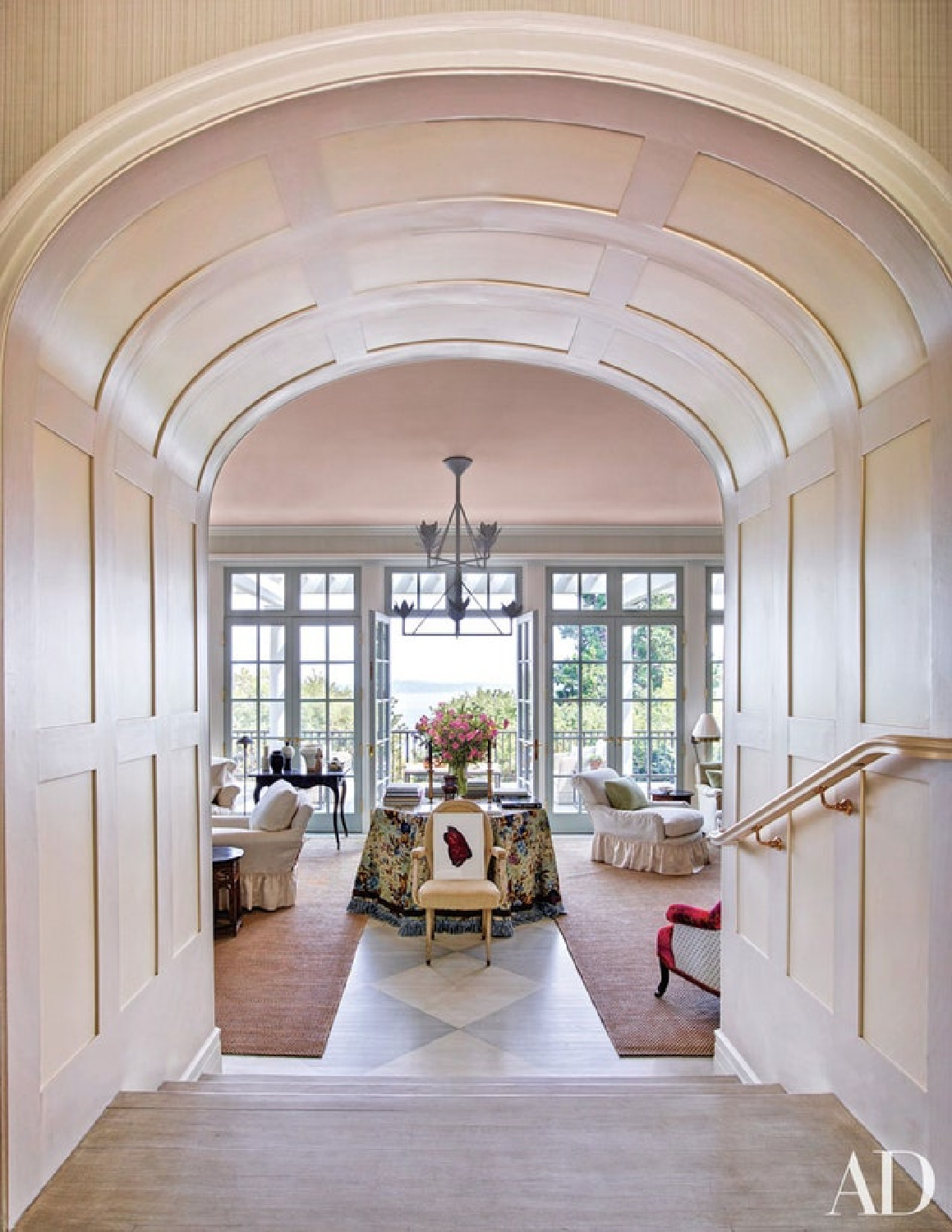 Setting Plaster pink paint color. Jeffrey Bilhuber designed room with pink ceiling. Paint color is Setting Plaster. This dusty pink is named after the blushing walls we often admire in newly plastered houses. It is definitely a pink in historic terms, but has a certain softness to it due to the inclusion of yellow pigment. Our timeless Setting Plaster creates a wonderful backdrop to antique furniture, and also works incredibly well when paired with Mahogany in a more contemporary home. Come see the Best Sophisticated, Chic and Subtle Pink Paint Colors!