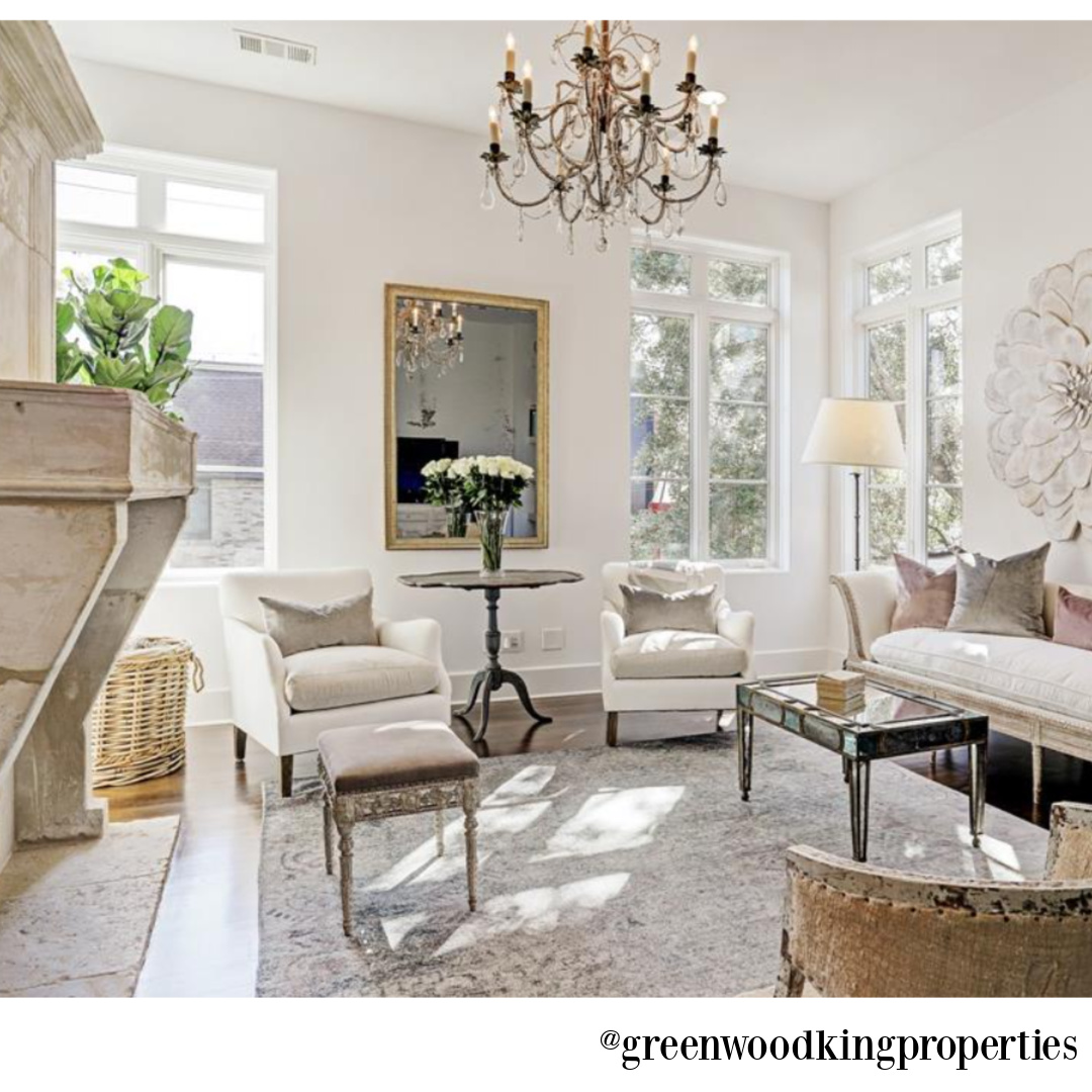 Sophisticated modern French white living room in a Houston home on Berthea with design by M Naeve - @greenwoodkingproperties