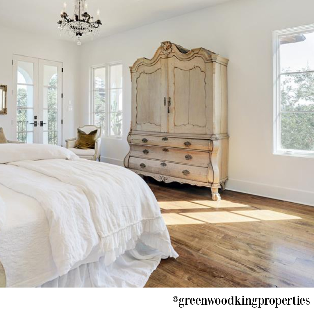 Elegant French country white bedroom design by M Naeve in a Houston home. #frenchcountry #bedroomdecor #mnaeve