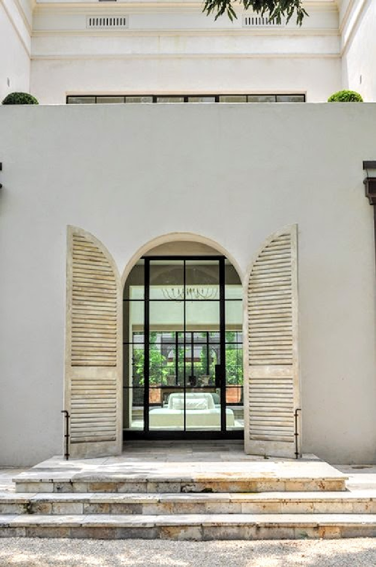 Elegant French country exterior with shutters and steel windows - architect: Regan Andre; design: Pamela Pierce. #frenchcountry #houseexterior #frenchhome #shutters #stonesteps #reaganandre #pamelapierce