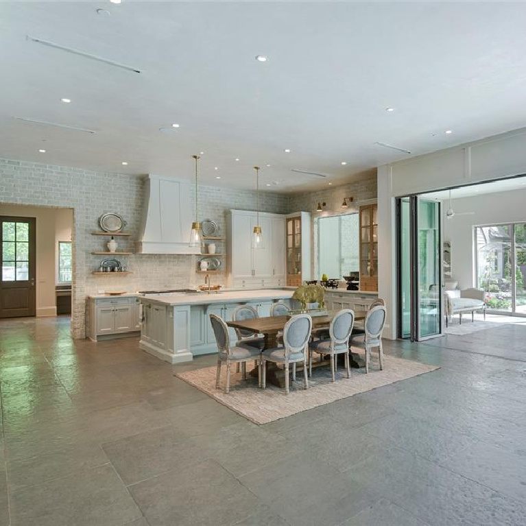 Fantasy kitchen and breakfast dining in Stunning French inspired luxury home in Houston. #luxuryhome #frenchhome #frenchcountry #sophisticateddecor #timelessdesign #kitchendesign