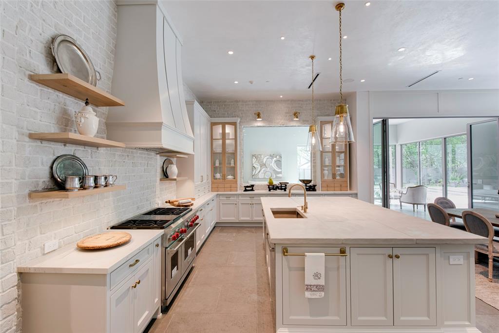 Dream kitchen in Stunning French inspired luxury home in Houston. #luxuryhome #frenchhome #frenchcountry #sophisticateddecor #timelessdesign #dreamkitchen #kitchens