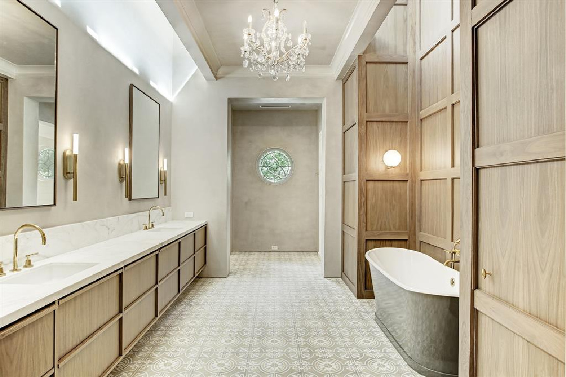 Old world elegance, authentic European antique construction materials, and Segreto finishes throughout this stunning Houston home. #luxuryhomes #interiodesign #oldworldstyle #frenchcountry #sophisticateddecor #bathroomdesign