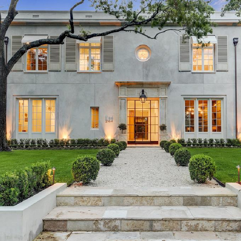 Stunning European elegance and curb appeal for this Houston home built by Morris Hullinger. #frenchcountry #houseexterior #dreamhome #stuccohome #europeancountry #houseexteriors