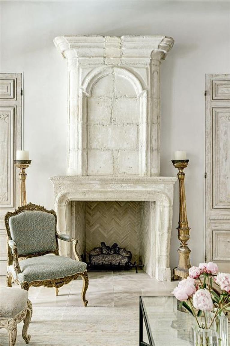 Pale and serene French interiors in a luxurious Houston home built with authentic European materials and bespoke finishes. #timelessdesign #interiordesign #frenchcountry #europeancountry #antiques #oldworldstyle #modernfrench #limestonefireplace #frenchmantel