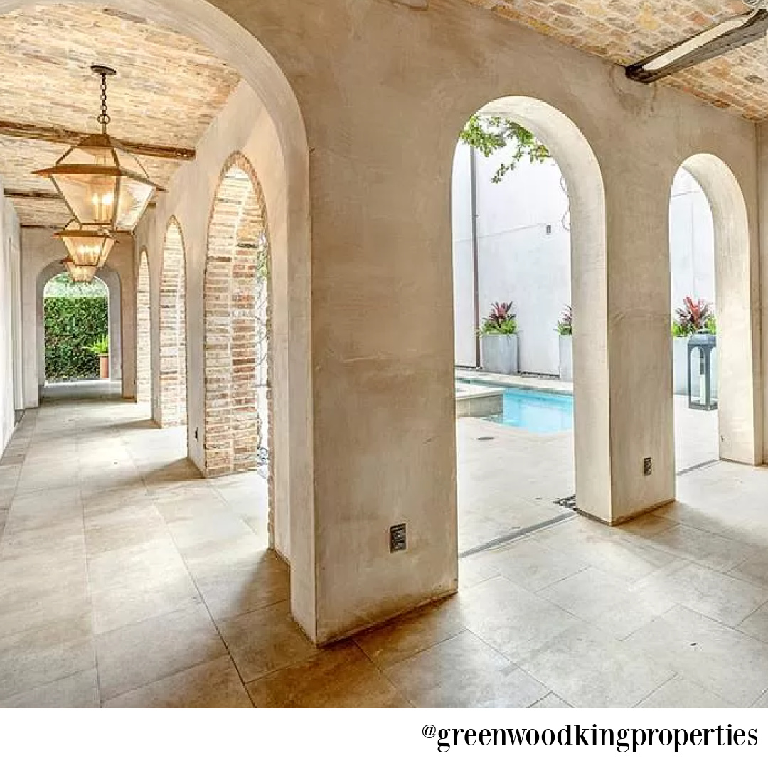 Stone loggia in modern French Houston Home (1119 Berthea St.) - @greenwoodkingproperties. #modernfrench #interiordesign