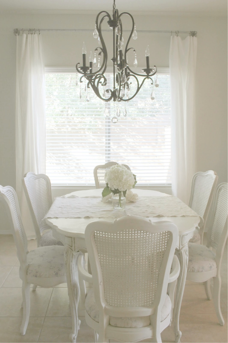 Beautiful serene shabby chic dining room painted Valspar Salute - Hello Lovely Studio. #diningroom #valsparsalute #hellolovelystudio #shabbychic #frenchcountry