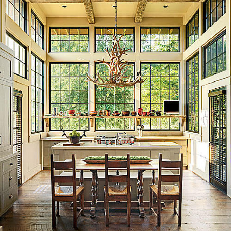 Magnificent windows and lofty ceiling height in a kitchen of a Jeffrey Dungan designed home. #jeffreydungan #kitchen #rusticelegance