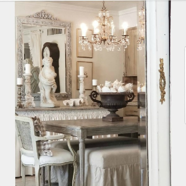 Layered with interest and shades of white to greige, this dining room by The French Nest Co is serene and timeless. #frenchfarmhouse #diningroom #countryfrench #whitedecor #allwhitedecor #oldworldstyle