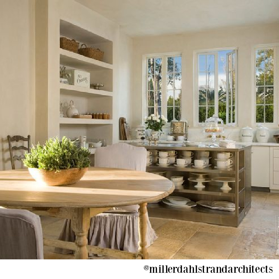 Rustic elegant French farmhouse kitchen by Pamela Pierce with rustic antiques and reclaimed materials from Chateau Domingue - @millerdahlstrandarchitects