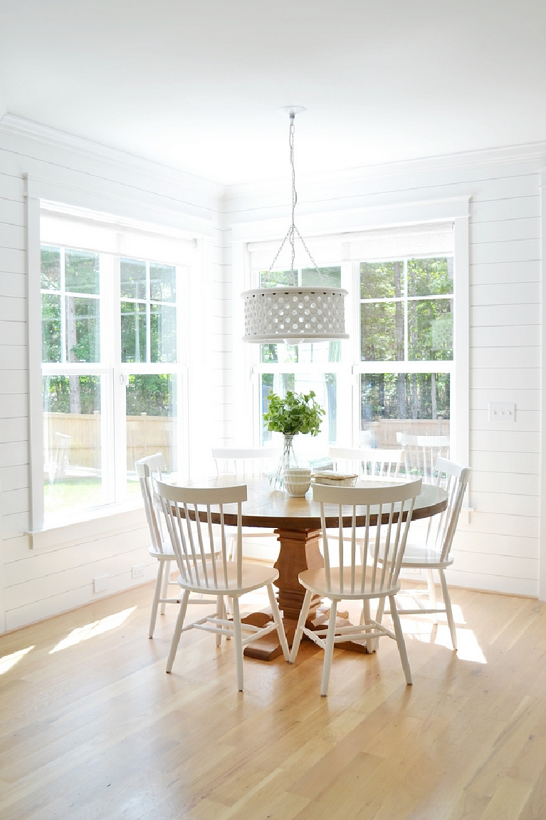 Sherwin Williams Extra White paint color on walls of breakfast room - Chrissy Marie Blog. #sherwinwilliams #extrawhite #whitepaintcolors #paintcolors #interiordesign #bestwhites