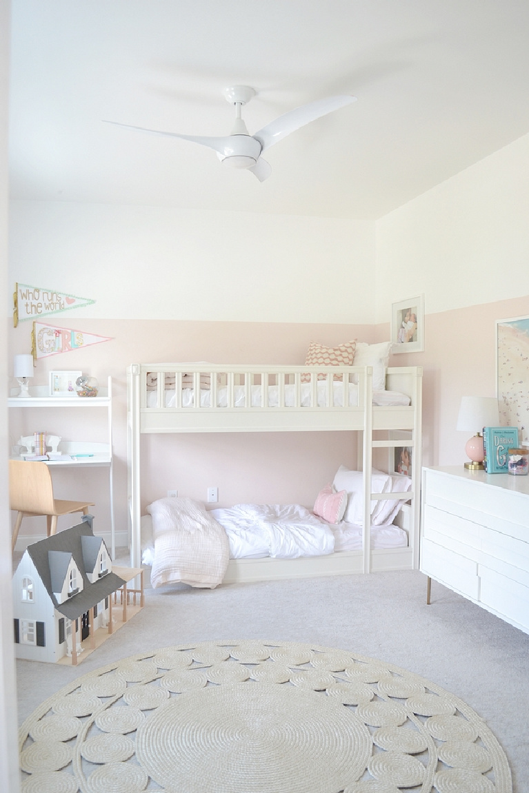 Sherwin Williams Extra White paint color on walls in girls bedroom. Pink paint is Valspar Sweet Pastel - Chrissy Marie Blog. #sherwinwilliamsextrawhite #paintcolors #bestwhites #valsparsweetpastel #pinkwalls #interiordesign #bedroomdecor