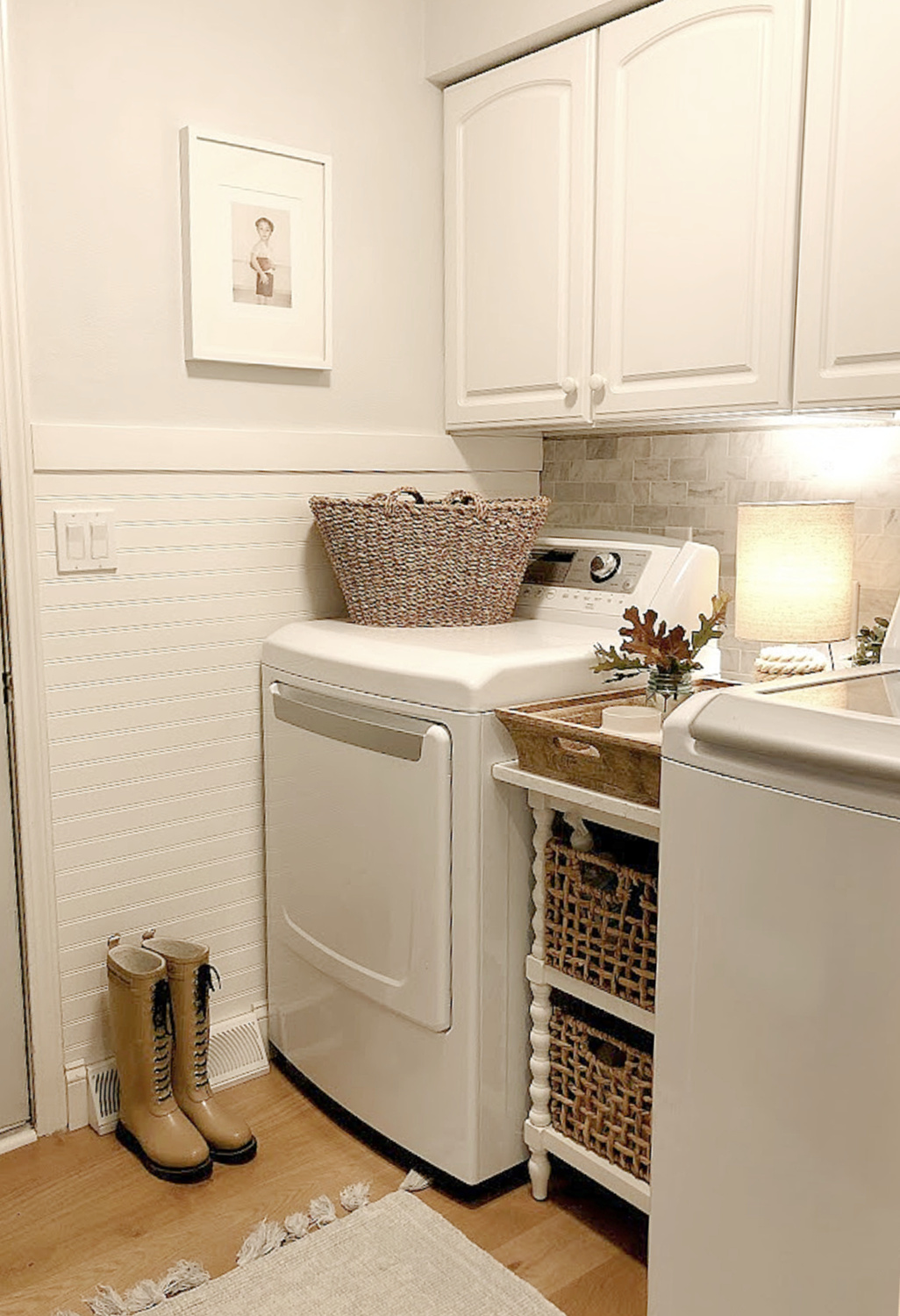 Our former laundry room got a marble mosaic backsplash, pale blue grey walls, and beadboard paneling - Hello Lovely Studio.