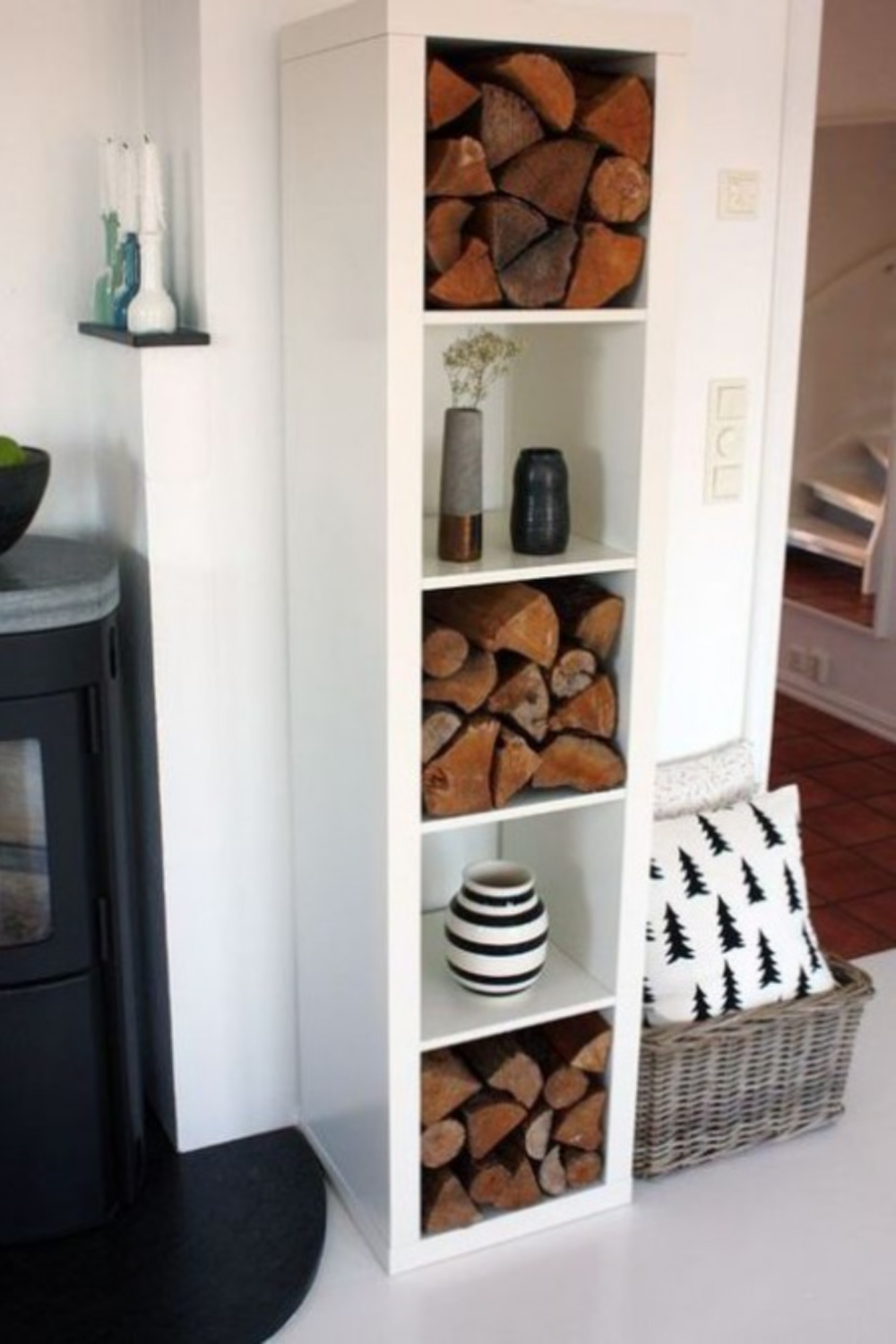 Kallax shelf for firewood storage and artful display. #ikeafurniture #kallaxshelf #kallaxhacks