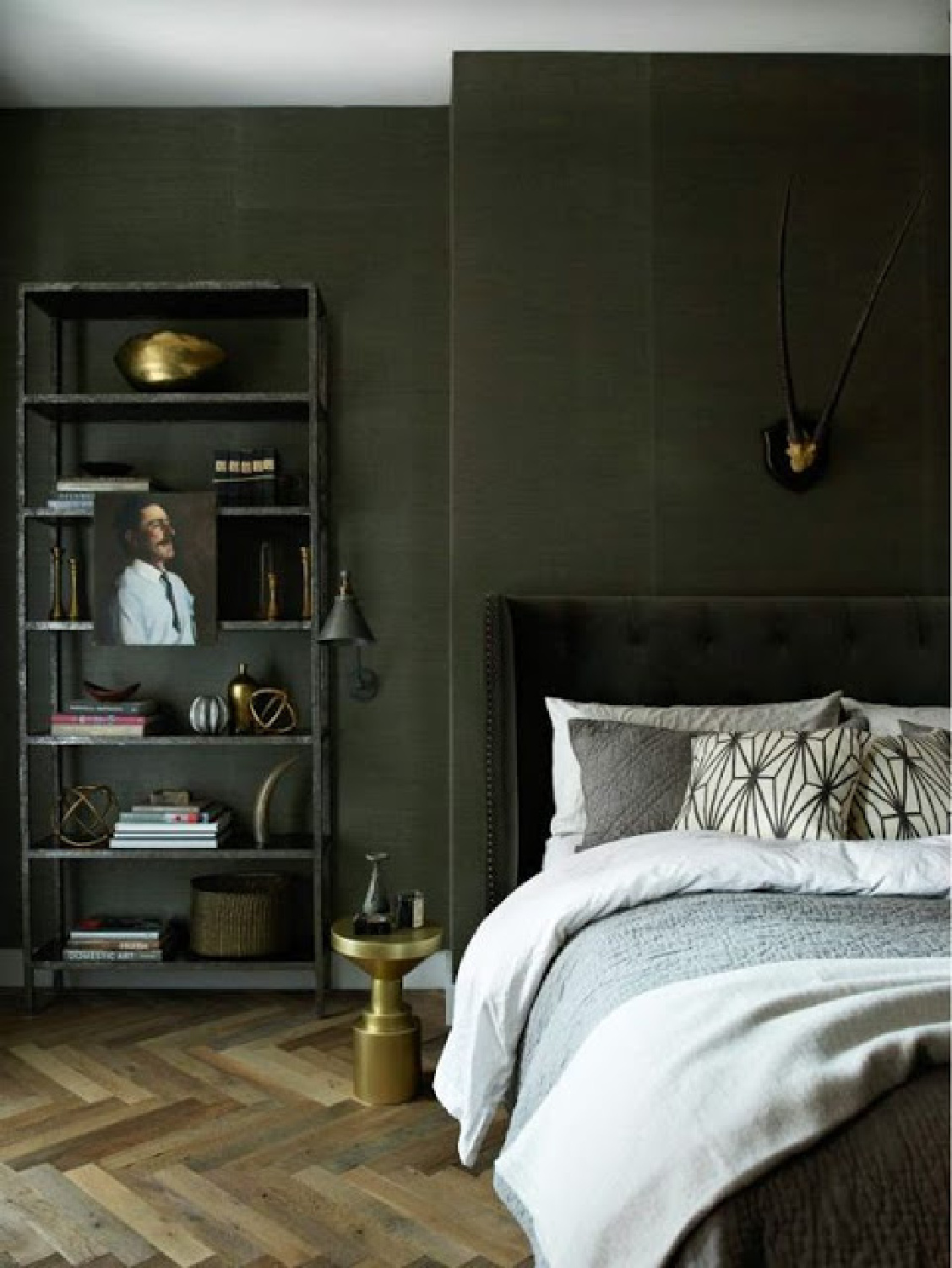 Gorgeous dark green walls in bedroom with herringbone floor on Hello Lovely. Come explore Dark Green Paint, Autumnal Greens & Interior Design Inspiration!