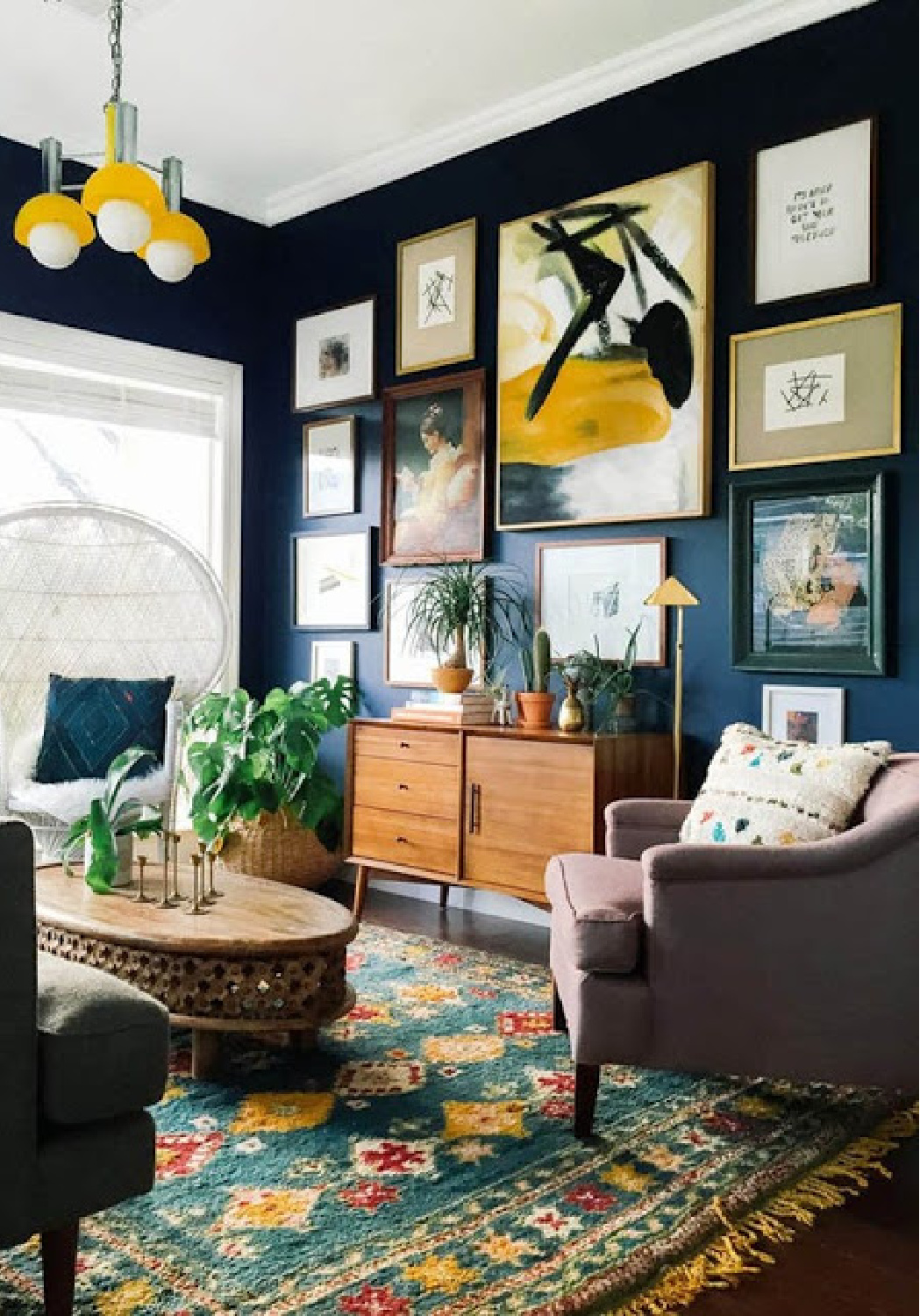 Dark green walls and art wall in living room - Come explore Dark Green Paint, Autumnal Greens & Interior Design Inspiration!